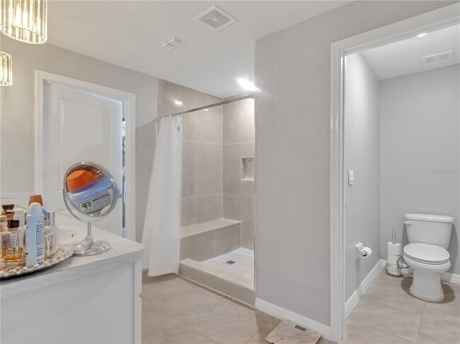 Building Photo - 5289 Fiddle Fig Ave