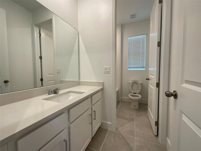 Building Photo - 3220 Canna Lily Pl