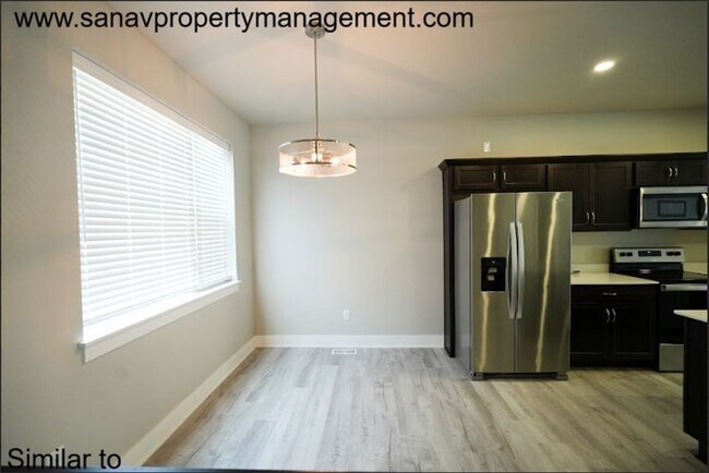 Building Photo - Modern 3-Bedroom Ranch in Grimes with basement-Available End of April!