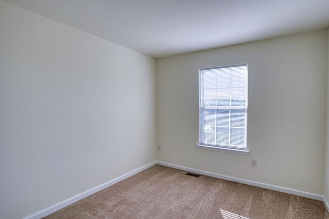Building Photo - New, New, New - Spacious 3 Bedroom Townhouse with a Finished Basement !!
