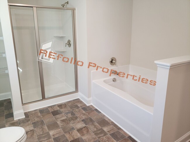 Building Photo - Charming 4 Bedroom, 2.5 Bath, 2-Car Garage...