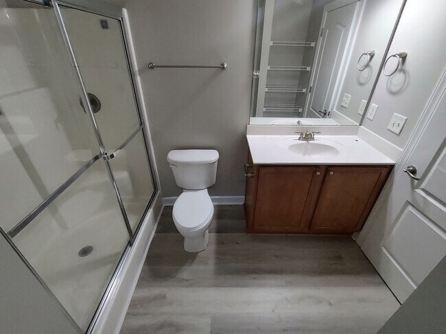 Building Photo - BRAND NEW FLOORING & FRESH PAINT - 3 Bedroom/2.5 Bath Townhome with garage in Wild Wing!