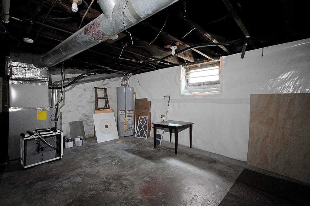 Basement w/ washer/dryer and storage. - 328 W 1st Ave