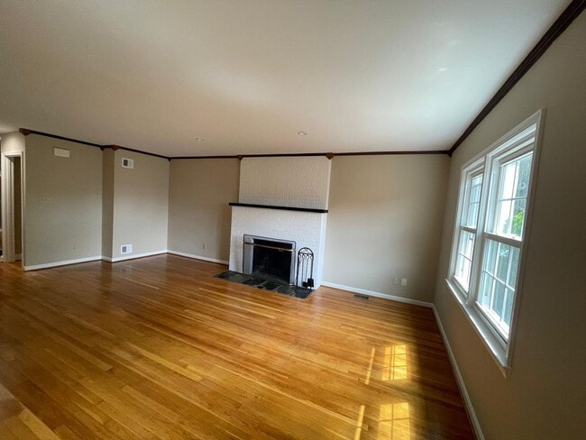Building Photo - A fully updated Four Bedroom, Three and On...