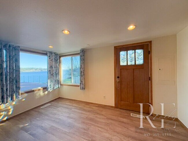 Building Photo - Waterfront Bliss: Stunning Puget Sound Views & Your Own Private Beach!