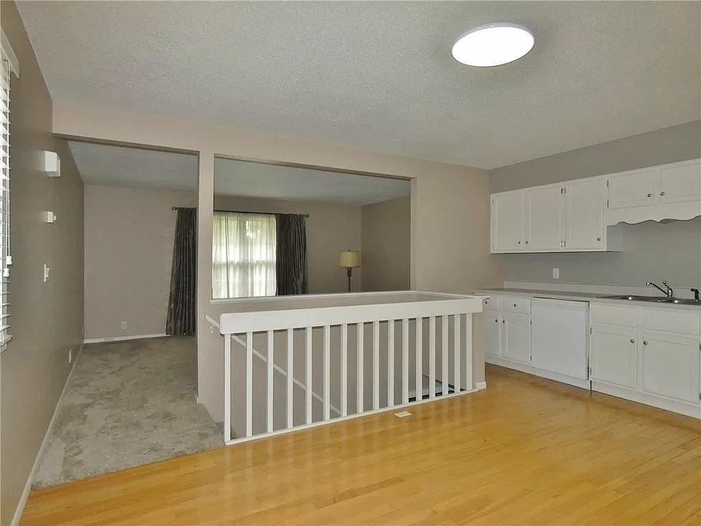 Kitchen looking into Living Room - 77 Brook Cir