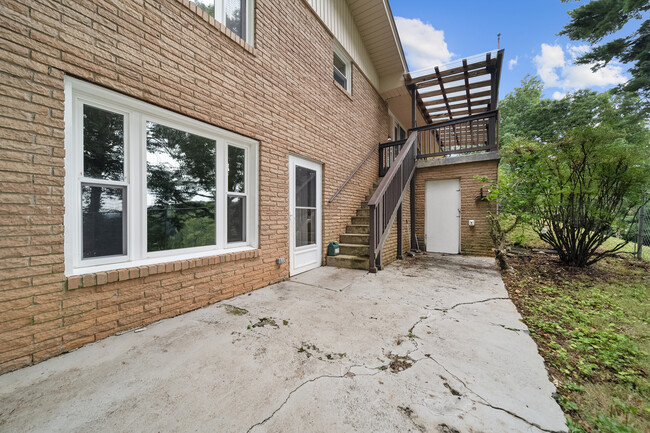 Walk out patio and stairs to deck - 162 Osborne St