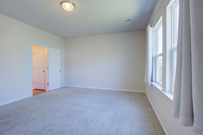 Building Photo - Spacious 4BR Rental with Stunning Kitchen & Covered Patio