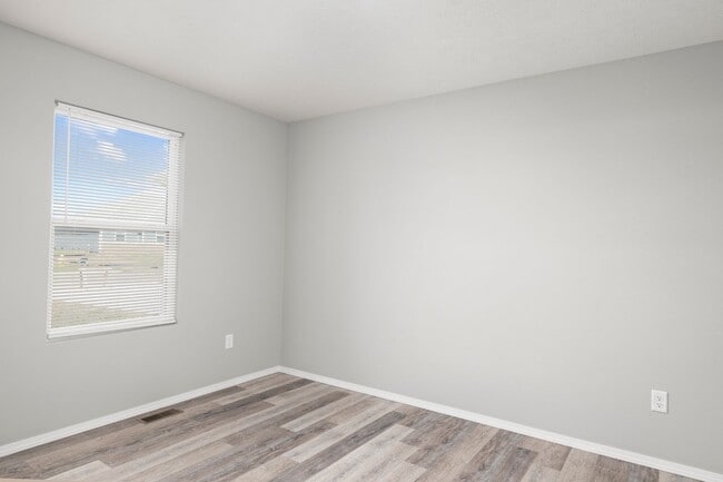 Building Photo - 4 bedroom home with a fenced in yard!