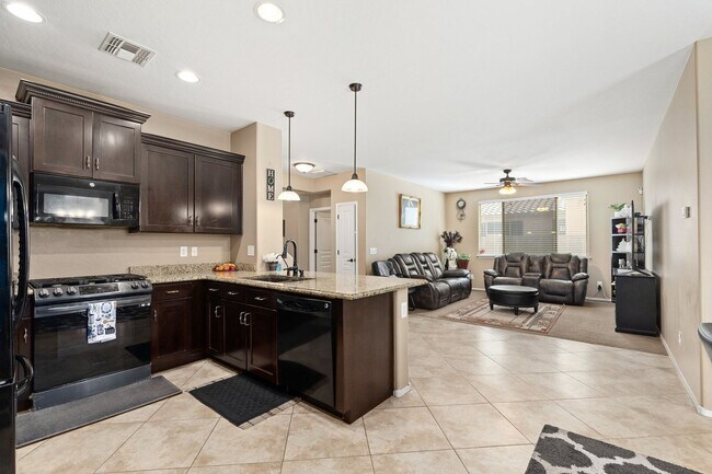Building Photo - Welcome Home! This stunning 4 bedroom, 3 b...