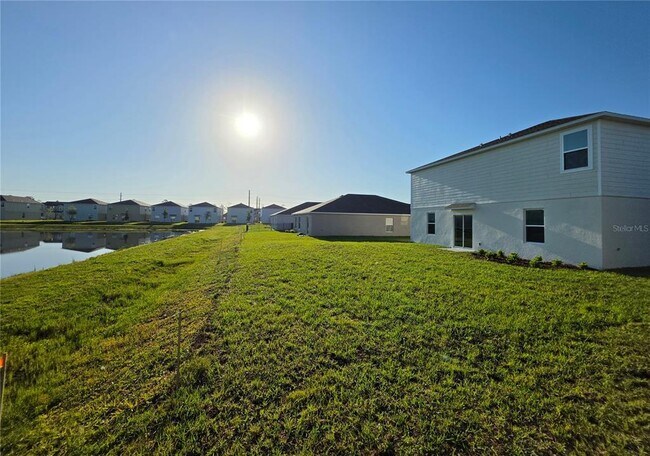 Building Photo - 5126 Magnolia Palm Dr