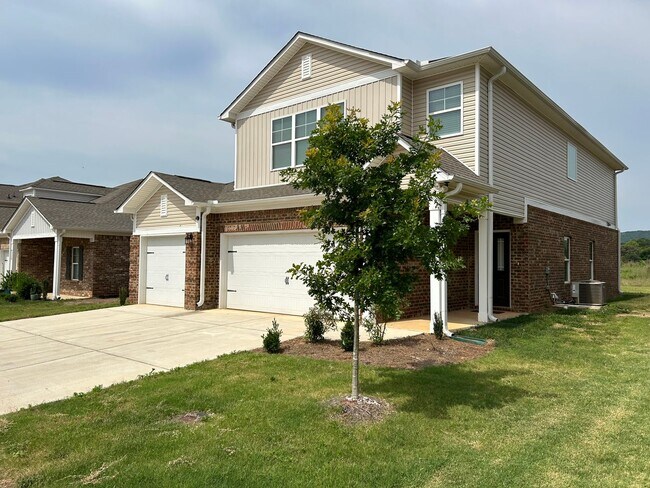 Building Photo - Three car garage Two story home close to e...