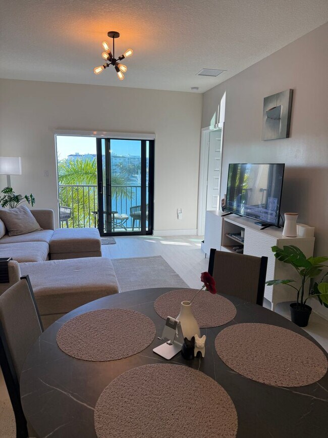 Building Photo - Premium Lake-View URBANA Residence Steps from Downtown Doral