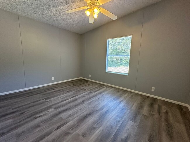Building Photo - Privacy and Space in this 3/2 Home at the ...