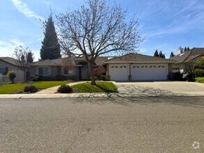 Building Photo - $500 off 1st months' rent! Excellent 4 bdr...