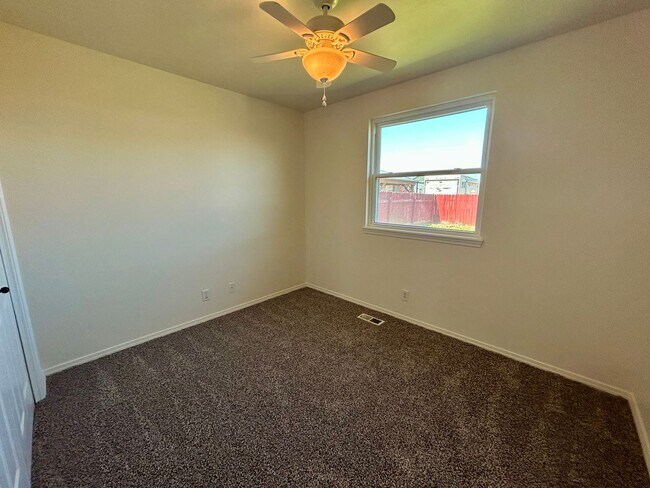 Building Photo - Spacious 4-Bedroom Home with RV Parking & No Backyard Neighbors
