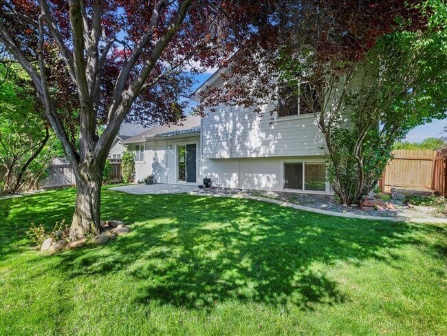 Building Photo - June Rent Free!!  Move Today!  Four Bedroom, Three Bath Home with Beautiful Backyard, Two Car Gar...