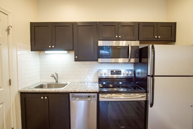 Building Photo - Contemporary 1-Bed Townhouse w/ Electric Fireplace!