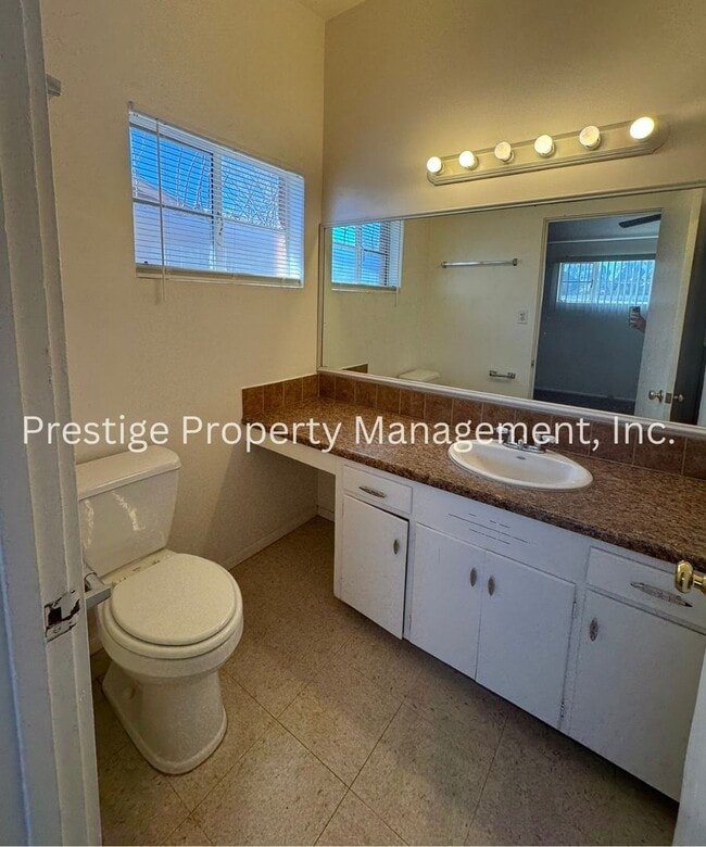 Building Photo - Stop Your Search! This 3/2+ Bonus Room is Centrally Located with a Pool and More!