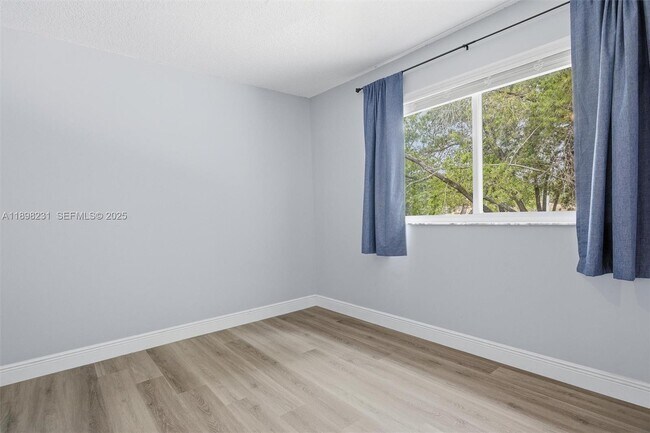 Building Photo - 12153 SW 49th Ct