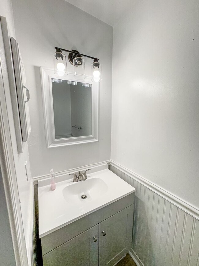 Building Photo - Introducing our spacious townhouse located...