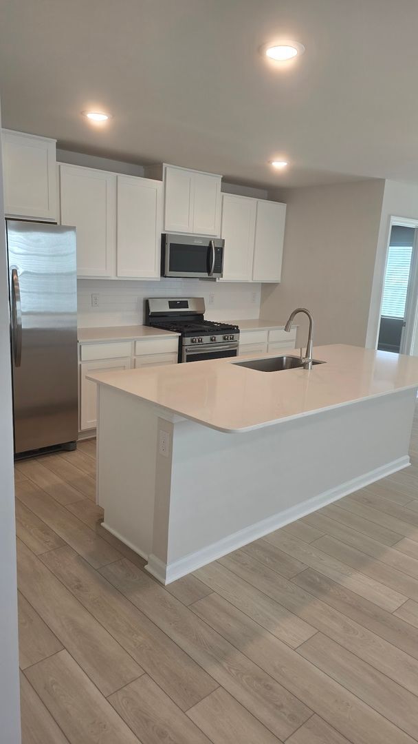 Building Photo - New Home with 5BR/2.5BA, Loft Area, Primar...