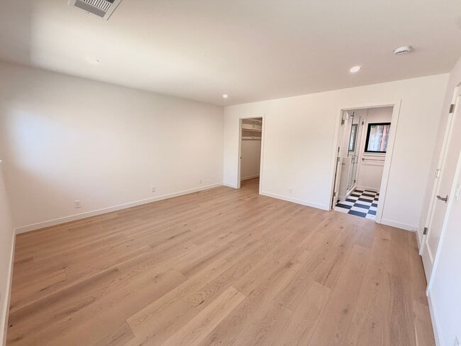 Building Photo - This premier 4-bed, 3-bath estate spans 2,565 sq. ft. on a 10,253 sq. ft. lot in North Los Altos.