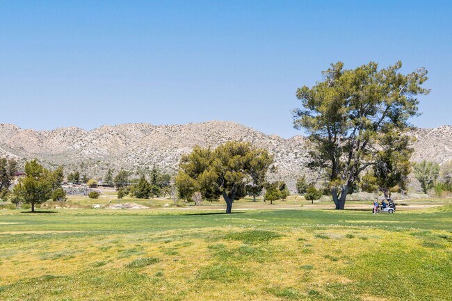 Building Photo - Get $1,000 Off + 1 Month Free at 55100 Airlane Dr!