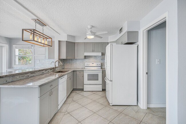 Building Photo - Waterfront 3BR/2BA Home – Walk to Beach + Boat Lift – $500 Off!