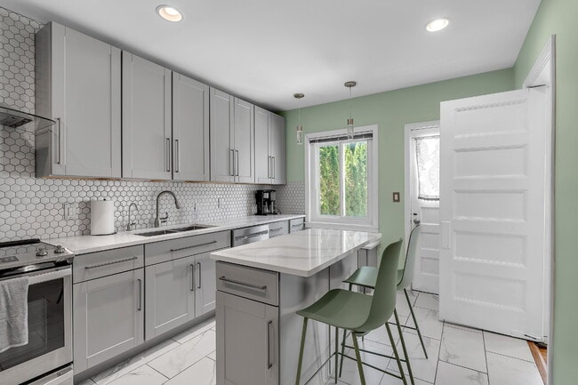 Building Photo - Furnished 4-Bedroom Home with a Private Pool near Elmwood Village