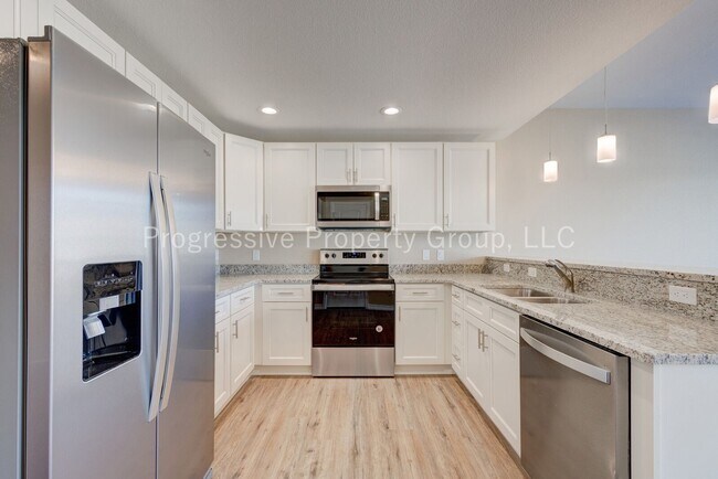 Building Photo - Welcome Home to Comfort, Style, and Breath...
