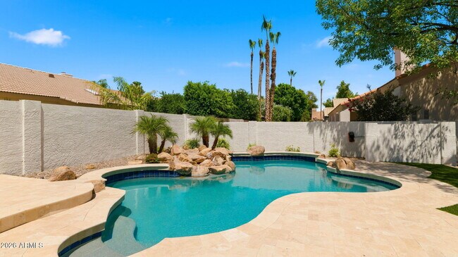 Building Photo - 8638 E Dahlia Dr