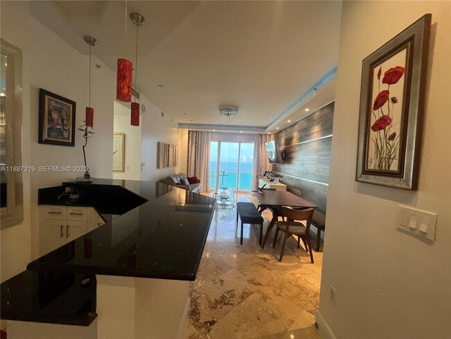 Building Photo - 6917 Collins Ave