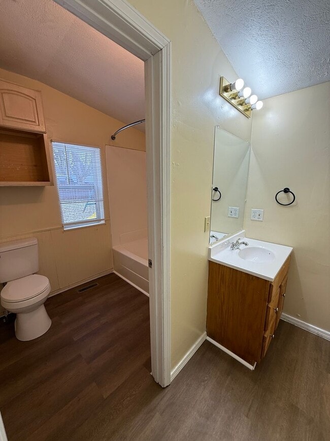 Building Photo - Spacious 4-Bedroom Home with Huge Fenced Backyard!