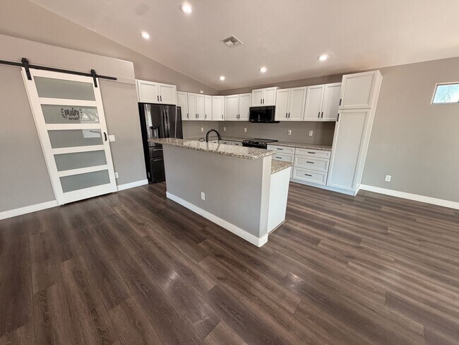 Building Photo - Renovated 5-Bedroom Corner Lot Home with Luxury Upgrades