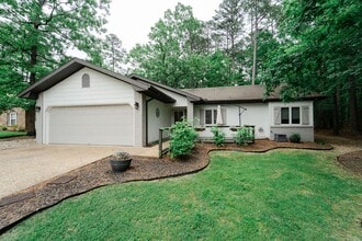 Building Photo - Charming 4 bedroom, 3 bathroom with lots of outdoor living space.