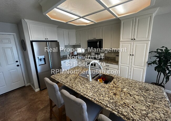 Building Photo - Large 5 bedroom home coming available in Layton