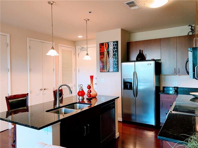 Building Photo - 711 Cosmopolitan Dr NE