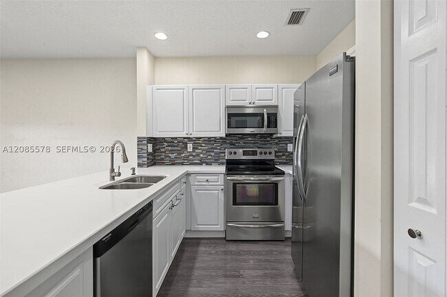 Building Photo - 5779 NW 116th Ave
