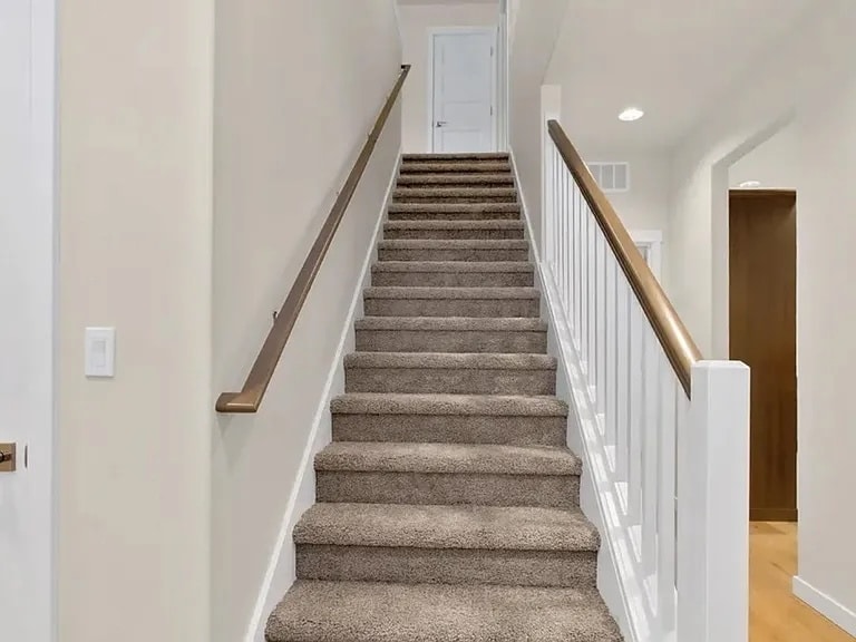 Staircase to upstairs - 711 Natalee Jo St SE
