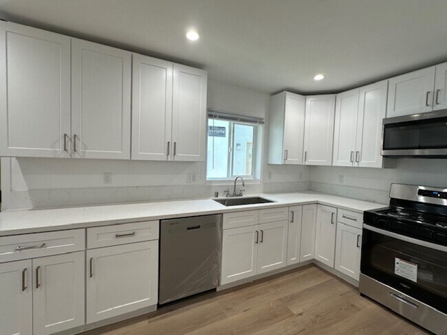 Building Photo - Completely remodeled and located on a quie...