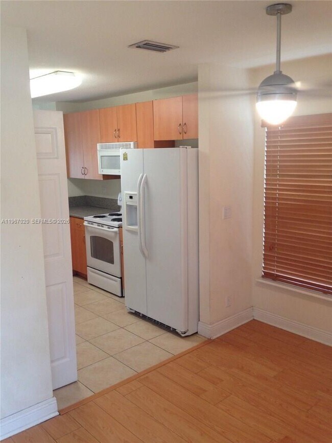 Building Photo - 10025 SW 24th Ct