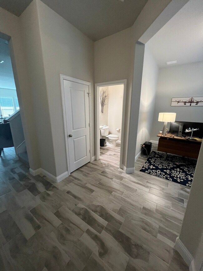 Front office and half bath - 1610 Charismatic Ct