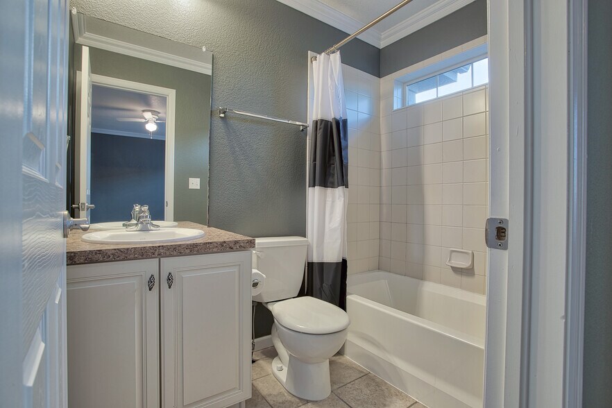 Attached bathroom for second bedroom - 7422 E 7th Ave Unit 14