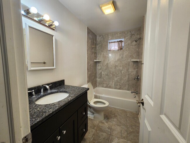 Building Photo - 106 N Dudley Ave