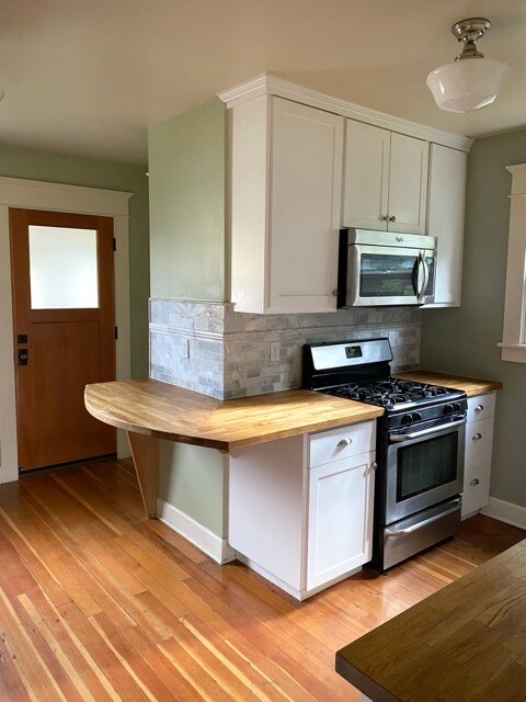 Building Photo - 5844 NE 12th Ave