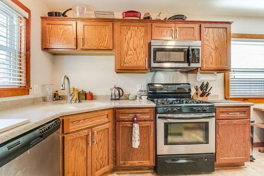 Corian counter tops, garbage disposal and Dish Washer - 7021 35th Avenue