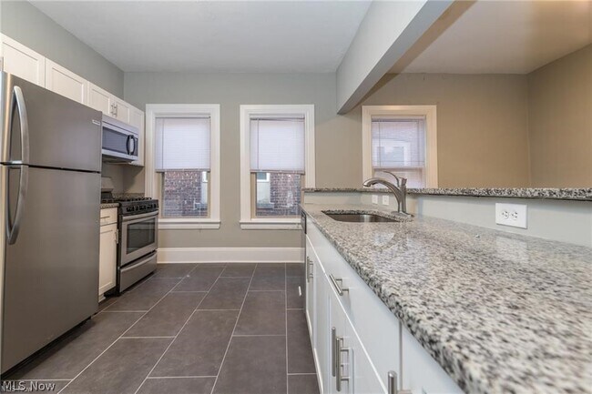 Building Photo - 1387 W 69th St