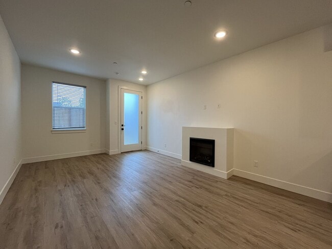 Building Photo - Modern 2-Bed, 1.5-Bath Condo with Custom Kitchen, Private Patio, and Prime Location