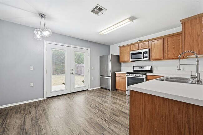 Building Photo - 11412 Robert Wooding Dr